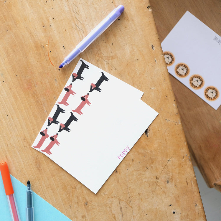 Sausage dog personalised notecard set for children on a desk